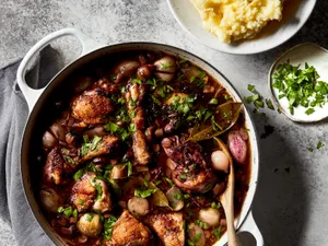 Classic Red Wined Coq Au Vin On A Pot Wallpaper