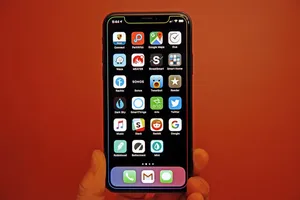 Clever Phone On Red Wallpaper