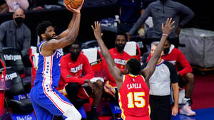 Clint Capela Tries To Block Opponent Wallpaper