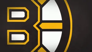 Close-up Of Boston Bruins Hockey Team Logo Wallpaper