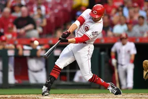 Close-up Of Joey Votto Hitting Baseball Wallpaper