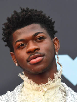 Close-up Photo Of Black Gay Man Lil Nas X Wallpaper