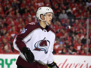 Close Up View Of Mikko Rantanen With Mouth Open Holding Hockey Stick Wallpaper