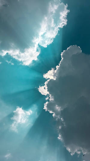 Clouds In Turquoise Sky Wallpaper