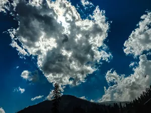 Clouds Over Mountains Wallpaper