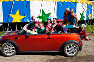 Clown Car Extravaganza Circus Tent Background Wallpaper