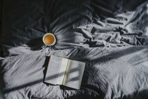 Coffee Book On Bed Wallpaper