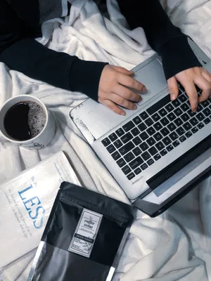 Coffee In Bed And Laptop Studying Wallpaper