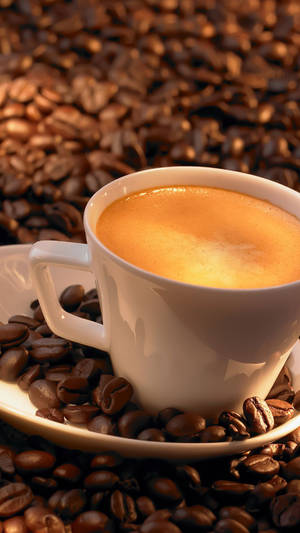 Coffee On Coffee Beans Wallpaper