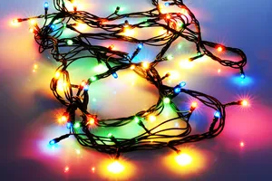 Colorful Christmas Lights On Floor Wallpaper