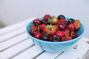 Colorful Mixed Berries In Bowl Wallpaper