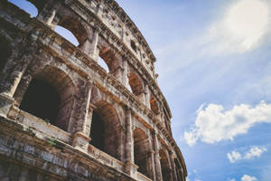 Colosseum Facing The Sun Wallpaper