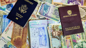 Columbian Passport And Banknotes Wallpaper