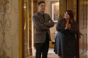 Comedic Actor Ed Helms Radiating Warmth Wallpaper