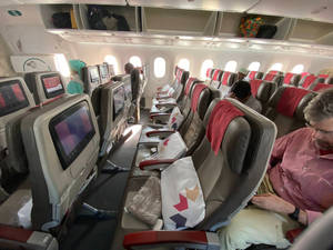 Comfortable Seating In A Royal Air Maroc Plane Wallpaper