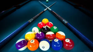 Competitive Billiard Match In Mid-play Wallpaper