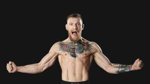 Conor Mcgregor In Black Background Wallpaper