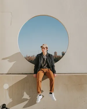 Cool Aesthetic Guy Sit Down Wallpaper