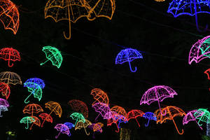 Cool Background Of Neon Light Umbrellas Wallpaper