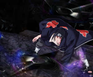 Cool Itachi In Intense Pose Wallpaper