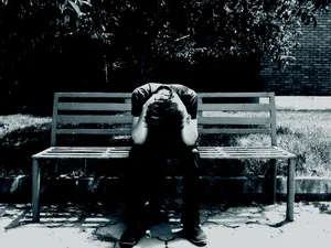 Cool Sad Boy Crying On Bench Wallpaper