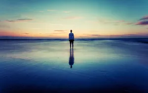 Cool Sad Boy Standing In Water Wallpaper