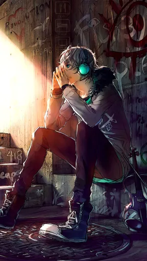 Cool Sad Boy With Headphones Wallpaper