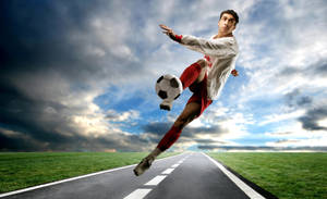Cool Soccer Player Kick Pose Wallpaper
