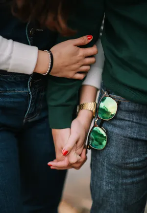 Couple Holding Hands Wallpaper