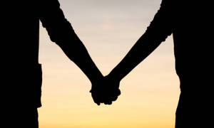 Couple Holding Hands Silhouette Sunset Sky Wallpaper