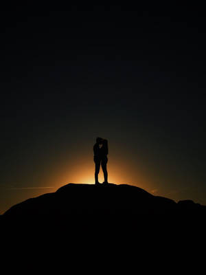 Couple In Love Silhouette Sunset Wallpaper