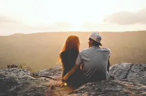 Couple Staring At Each Other Wallpaper