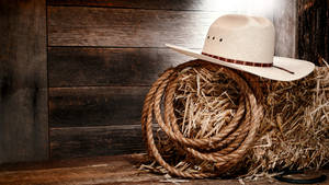 Cowboy Hat And Lasso Wallpaper
