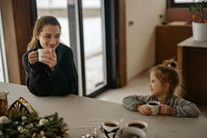 Cozy Morning Coffee With Child Wallpaper