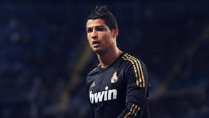 Cr7 Hd Walking Around Field Wallpaper