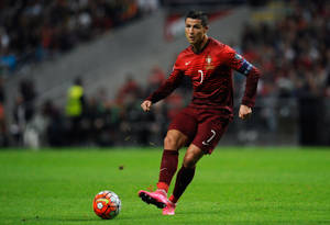 Cr7 In Red Uniform Wallpaper