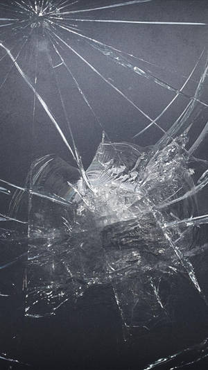 Cracked Screen On Gray Surface Wallpaper