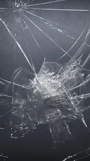 Cracked Screen On Gray Surface Wallpaper