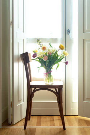 Craspedia And Roses Flower Bouquet On Wooden Chair Wallpaper