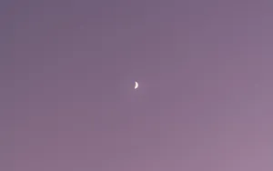 Crescent Moonin Twilight Sky Wallpaper