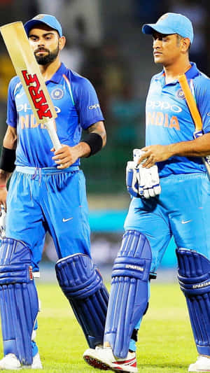 Cricket_ Icons_ In_ Blue_ Jerseys Wallpaper