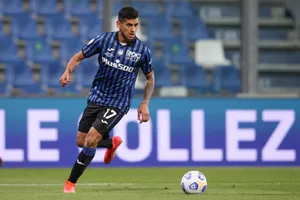 Cristian Romero In Blue Jersey Wallpaper