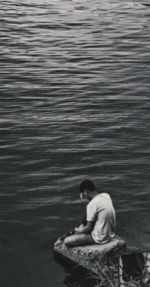 Crying Alone In Sadness Wallpaper