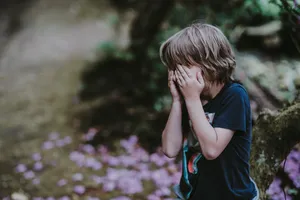 Crying Sad Boy At The Garden Wallpaper