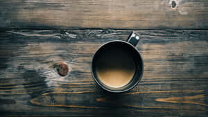 Cup Of Coffee With Cream Wallpaper