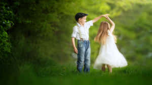 Cute Baby Couple Romantic Garden Dance Wallpaper