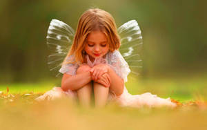 Cute Baby Girl Butterfly Wings Wallpaper