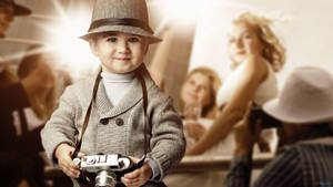 Cute Boy Photographer With Retro Camera Wallpaper