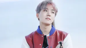 Cute Bts J-hope With Red And White Jacket Wallpaper