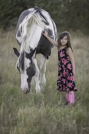 Cute Country Girl Pets Horse Wallpaper